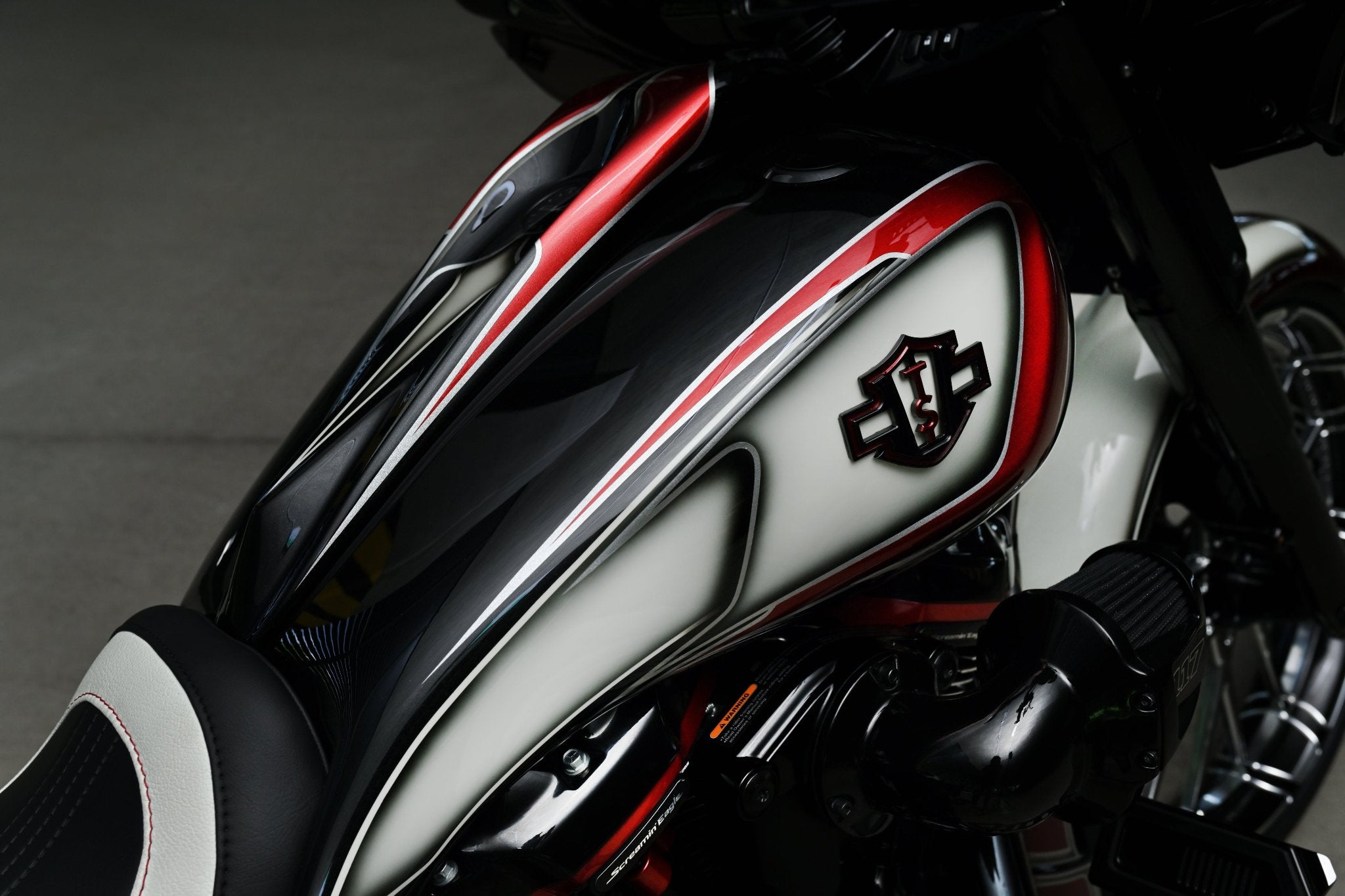 Celtic stretched tank shrouds mounted on a Harley Davidson Street Glide CVO, painted in red, white and black.