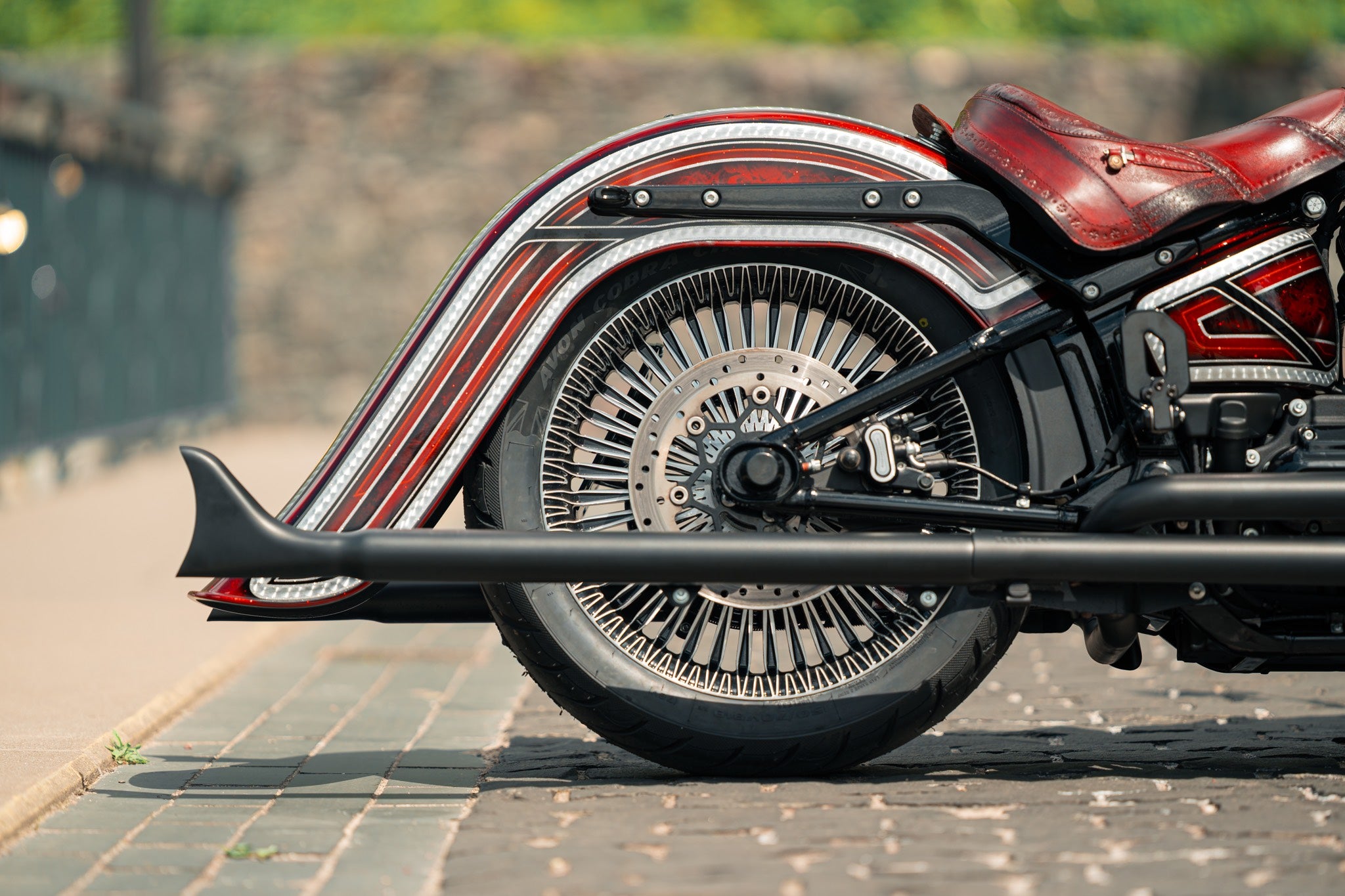 Close up shot of a chicano style stretched rear fender for Harley Davidson