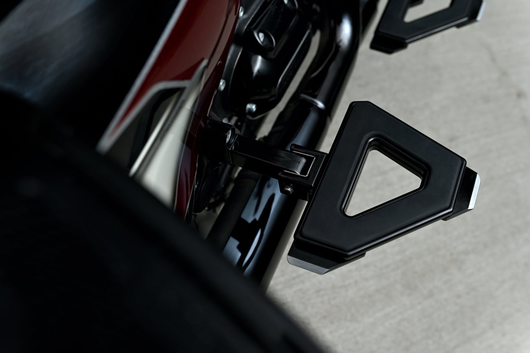 Performance series driver floorboards for Harley Davidson Touring models (Street Glide, Road Glide, Electra Glide, Road King) on motorcycle