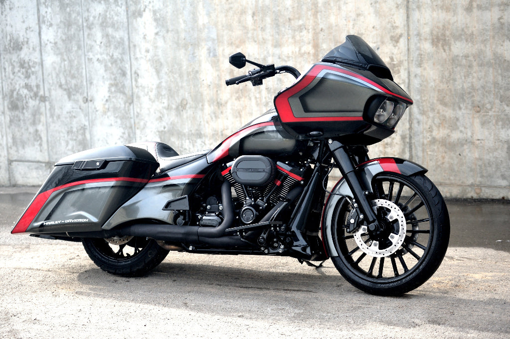 Front perspective shot of Harley Davidosn Road Glide with 21" wheel and stretched bagger style body kit.