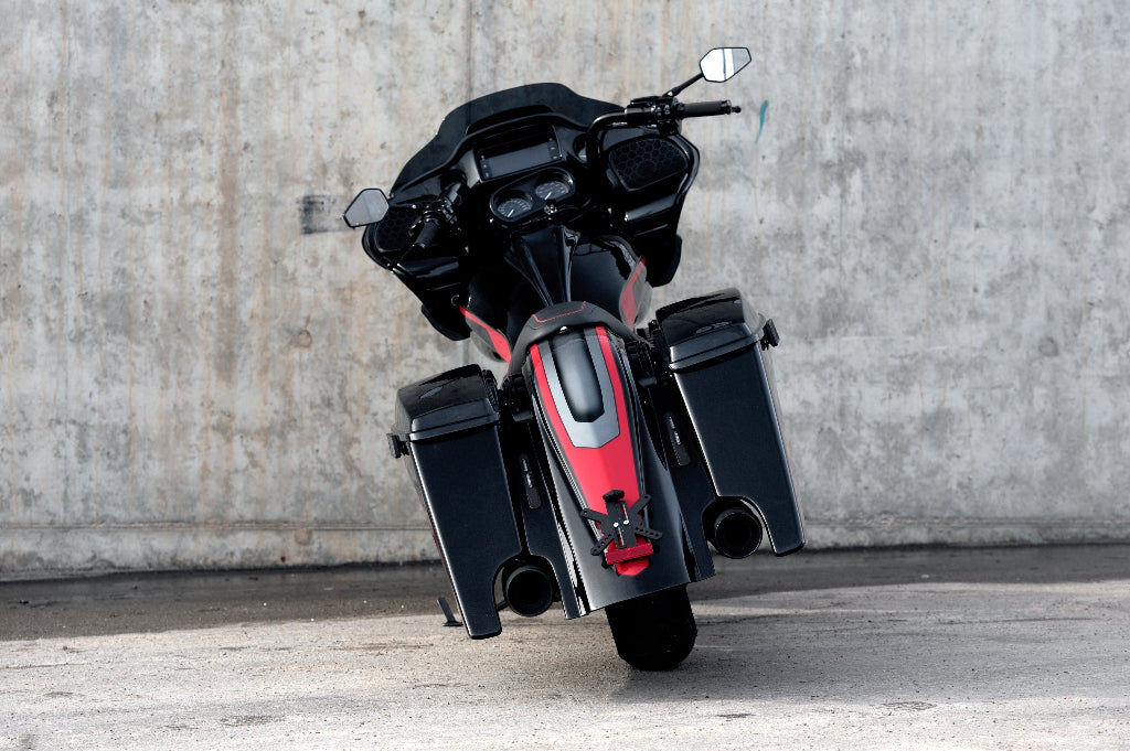 Custom Harley Davidson Road Glide 2021 photographed from rear. Stretched magnus rear saddlebags and fender are visible including with the LED taillights and adjustable number plate holder.