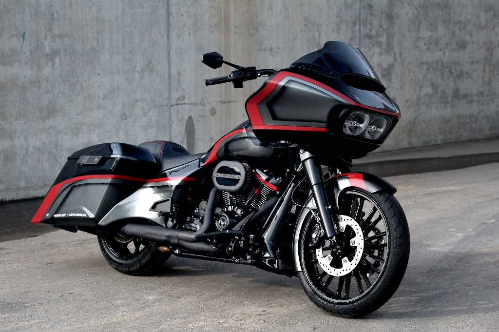 Left side perspective shot of a cutom Harley Davidson Road Glide with bagger style body kit and a 21" front wheel.