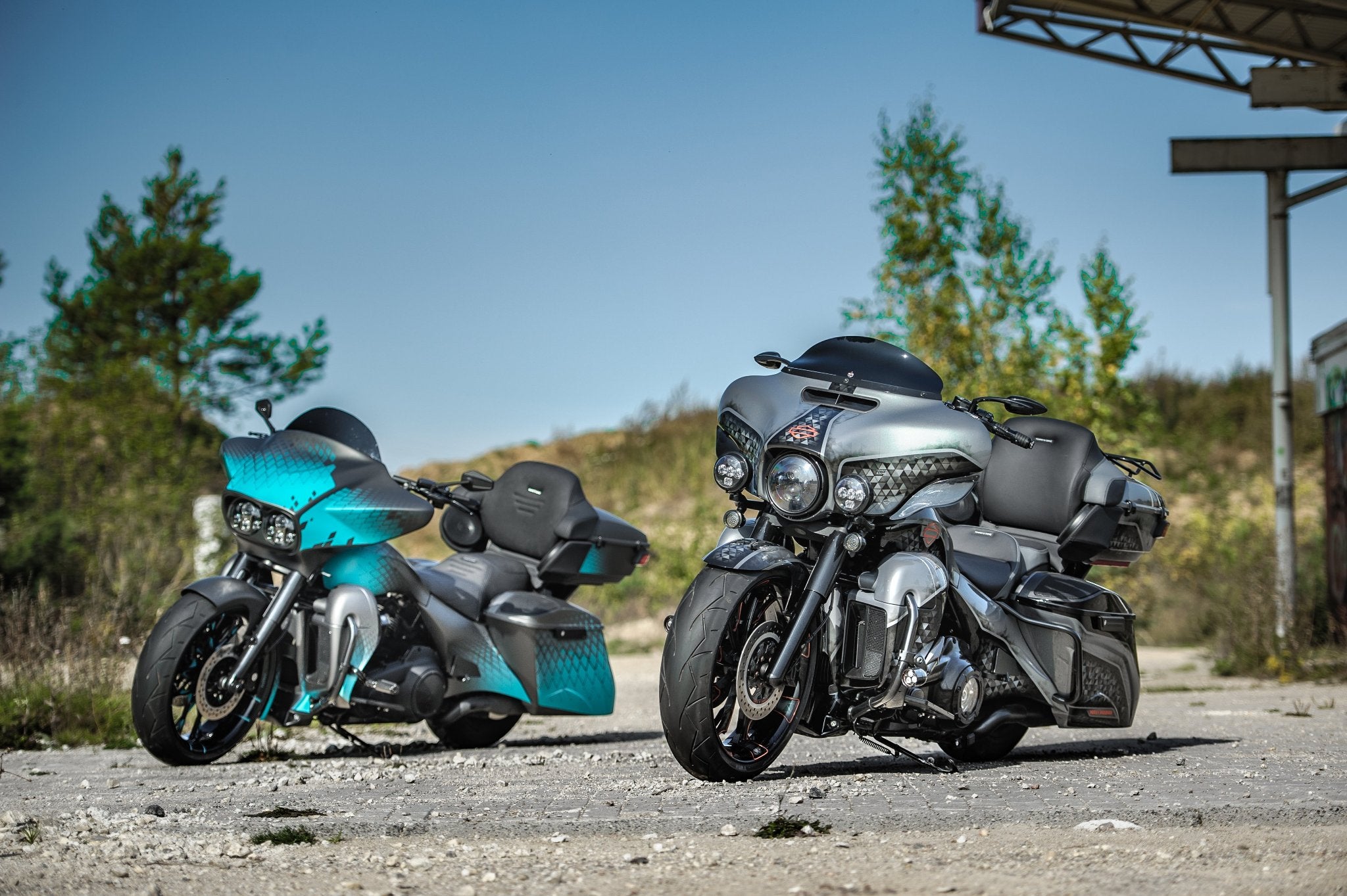 Two custom Harley Davidson motorcycles. One is Road Glide with modified fairing and full custom body kit, other one is Ultra Glide with full custom body kit.