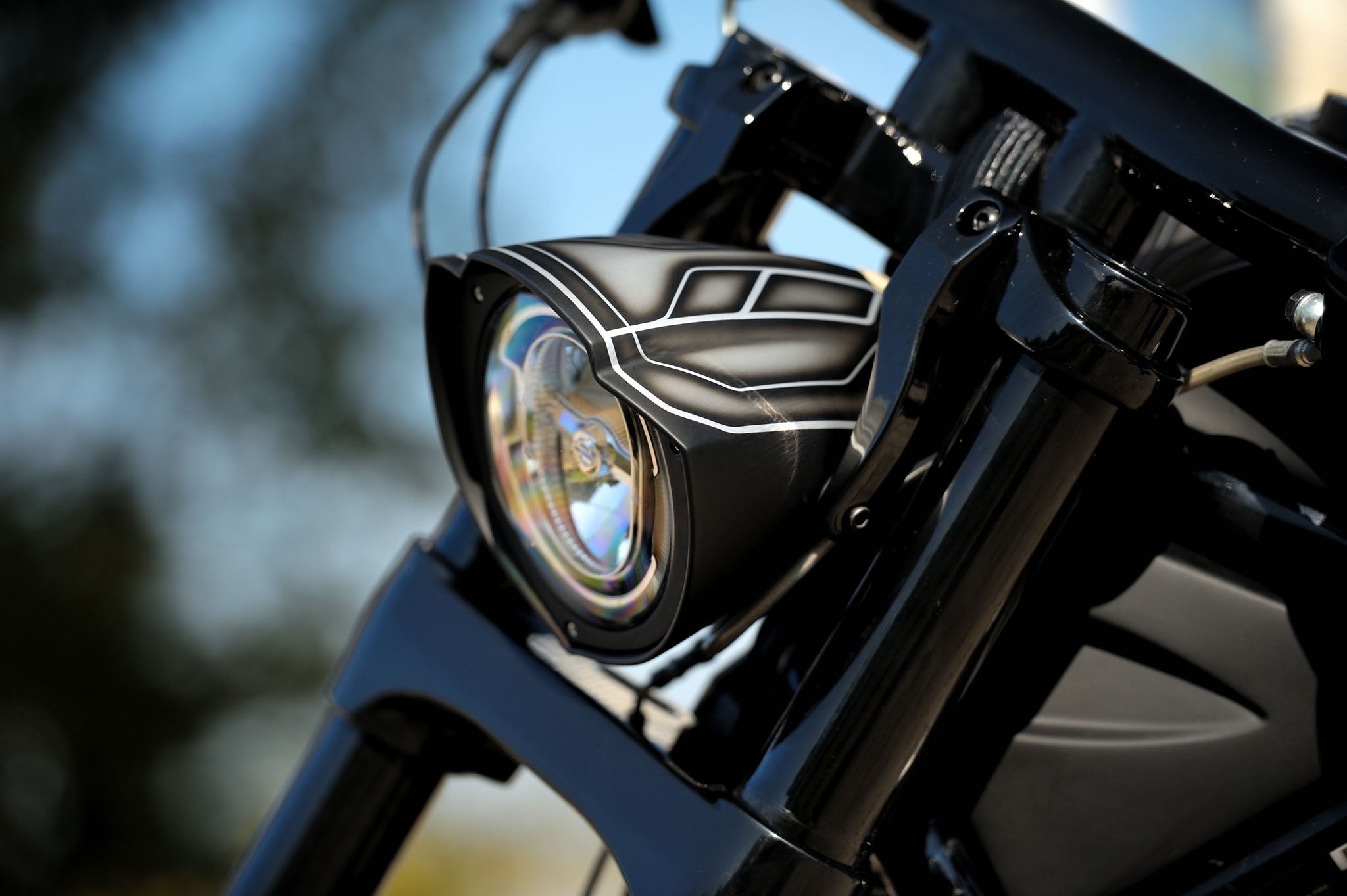 Custom Side Mounted headlight cover for a 5.75" Headlight fitted on a Harley Davidson V-Rod Muscle